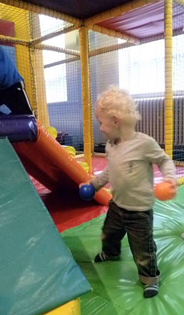 Edward gets to grips with the ball pool