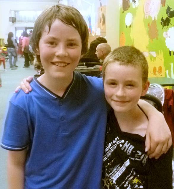 Ben and Luke having a breather from the bouncy castle