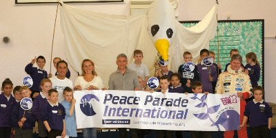 Jonathan Edwards (centre) with pupils at Sandbrook Community Primary