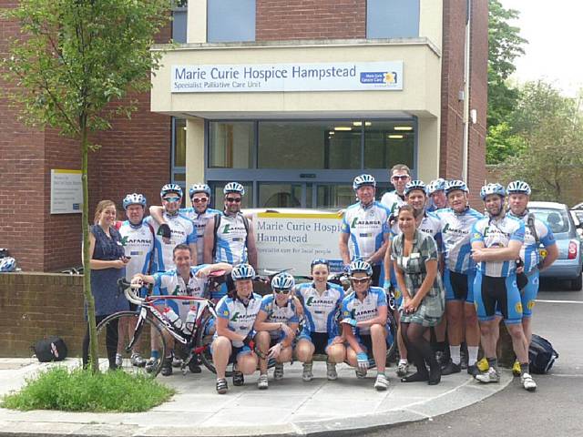 The team take a break outside the Marie Curie Hospice