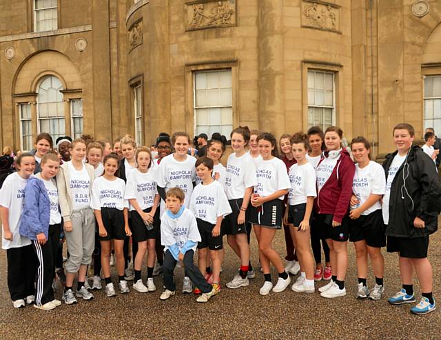 Nicholas's sister Grace, her friends and teachers having completed the park run in Heaton Park to support Nicholas's fund