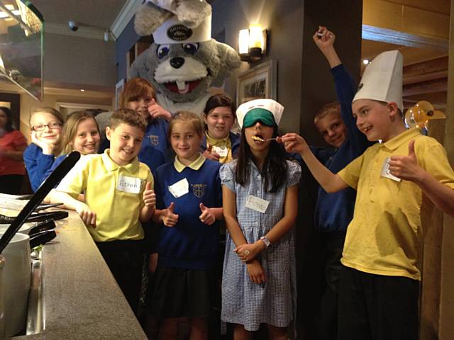 Pupils from St Edward’s School blind taste test vegetables from the Harvester salad bar