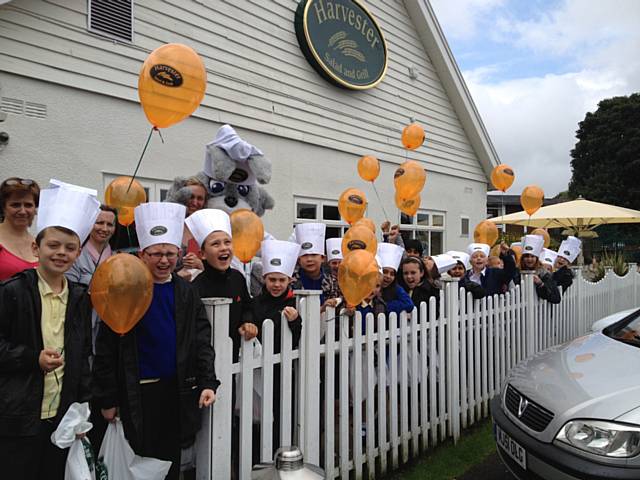 Pupils from St Edward’s School blind taste test vegetables from the Harvester salad bar