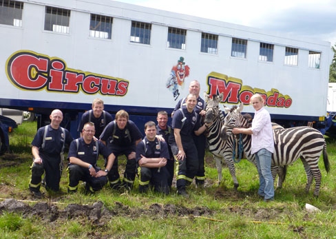 Firefighters from Heywood Fire Station visiting Circus Mondeo in Heywood