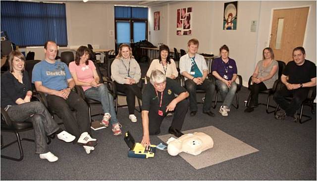 Whitworth Community High School receiving HeartStart and defib training from North West Ambulance Service