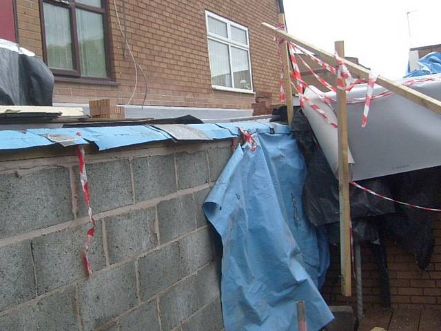 The collapsed handrail which led to two workers falling from the roof at Barlow Moor High School