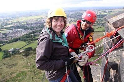 Sue Gernon and a member of the Rossendale and Pendle Mountain Rescue Team
