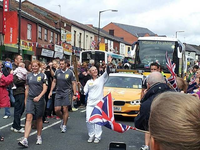 Jodie Mcnamara with the Olympic Torch in Heywood 