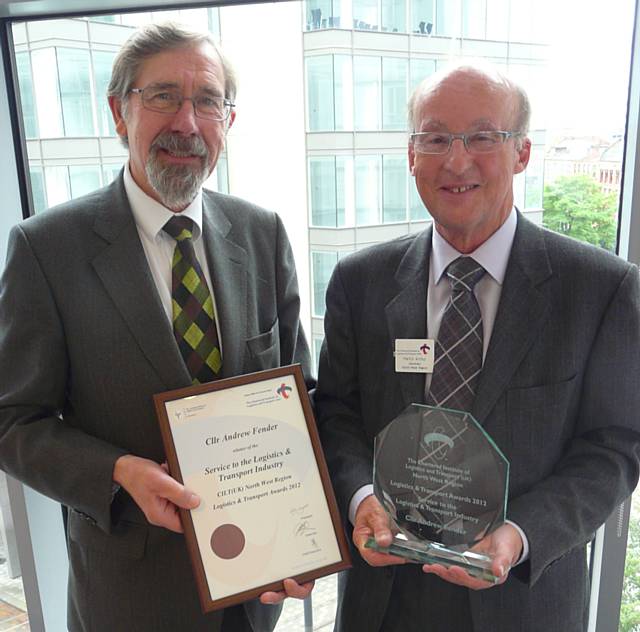 Councillor Andrew Fender, Chair of the TfGM Committee, being presented with his award by Martin Arthur, North West Region Secretary of the Chartered Institute of Logistics and Transport