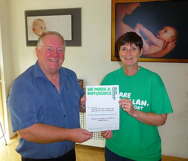 Graham Sivills, getting his certificate from local Macmillan organiser Rose Tipton