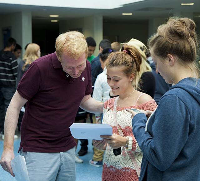 Mr Simms, Head of Modern Foreign Languages  speaking to Heather Baker
