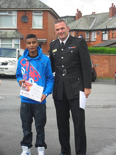 Mouzan Hussain with Oldham Borough Manager Kevin Talbot 