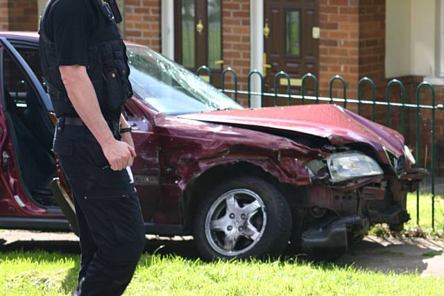 The red Honda on the corner of Red Lane, Buckley Road and Foxholes Road