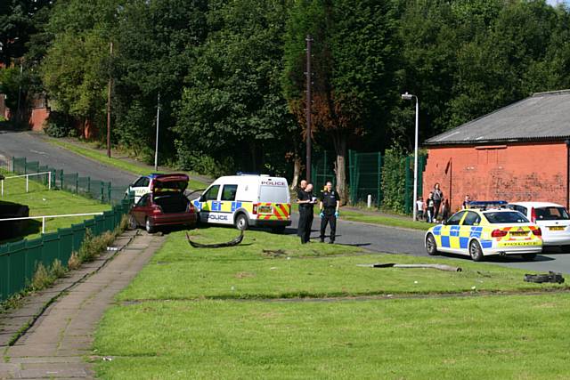 Police chased a red Honda ramming it into a railing on the corner of Red Lane, Buckley Road and Foxholes Road