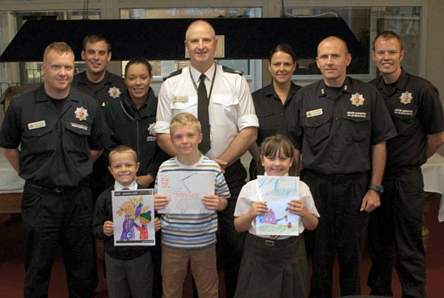 Ben, Daniel and Ella with Borough Manager Tony Lander in the white shirt and other members of the crew and fire safety team