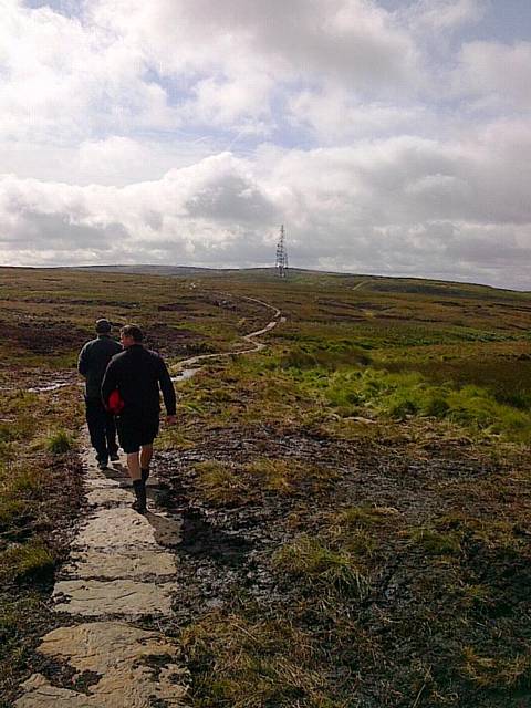 Walkers use the new 777 metre stone footpath above Rochdale on the Pennine Way.
