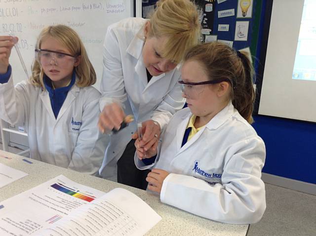 Pupils from St Edward’s CE Primary testing water samples from Springfield Park in the labs at Matthew Moss High School
