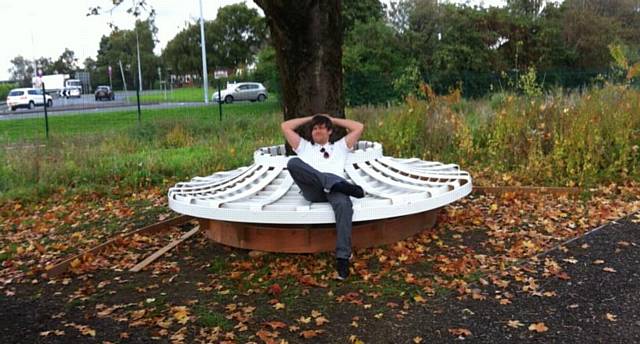 Volunteers build a bench in Q gardens