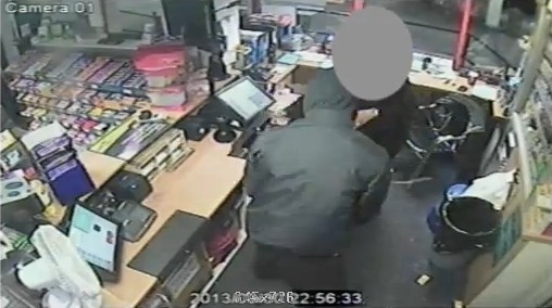 Image of masked robbers who held up Birch Services motorway service station 11.15pm, Monday 30 September 2013   
