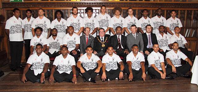 The Fijian Rugby League World Cup squad with (centre, left to right) Council Leader Colin Lambert, Mayor Councillor Peter Rush, Fijian High Commissioner Mr Ratu Solo Maba, Rochdale Borough Council Chief Executive Jim Taylor and Ryan Bradley, Chief Executive of Rochdale Hornets