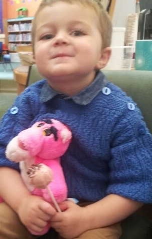 Archie Smithers, aged 2, and the pink panther enjoy a ‘cake pop’ at Balderstone Library’s Great Pink Bake Off - where staff and customers raised £202 for Breakthrough Breast Cancer by baking and selling a wide variety of cakes and biscuits