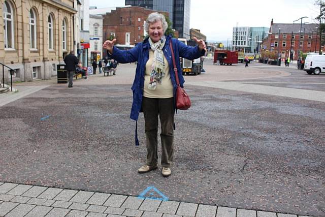 Margaret Royds looking at the blue marker which shows the area where the medieval bridge will be uncovered

