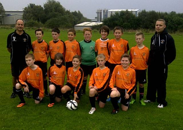 Roach Dynamos Blacks U12s, in their new kit, sponsored by housebuilder Persimmon Homes who are developing at neighbouring Fairfield View