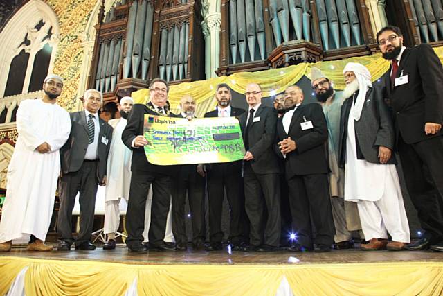 Rochdale Council of Mosques members presented Springhill Hospice with a cheque for £3,000