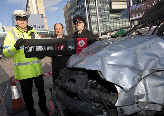 Inspector Matt Bailey-Smith, Deputy PCC Jim Battle, Group Manager Stuart Millington from Greater Manchester Fire & Rescue Service 