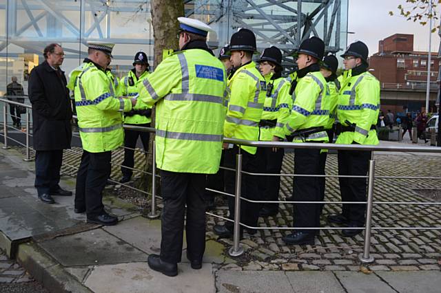 Deputy Police and Crime Commissioner Jim Battle with police officers 