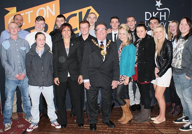 ‘Get on Track group celebrate’ – The thirteen participants on the Rochdale Borough Get on Track programme celebrate their success congratulated by the Mayor of Rochdale, Councillor Peter Rush and elite athletes James Goddard, Sophie Cox and Charlotte Hartley