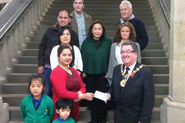 Mayor Peter Rush presents a cheque for £1,850