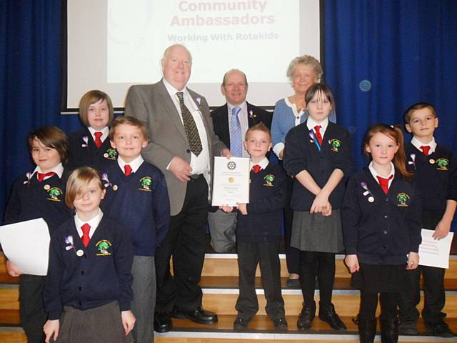 Community Ambassadors of Alkrington Primary School who were chartered as a RotaKids club by Middleton Rotary Club with Rotarians Jeff Lawton, Keith Trinnaman and Jean Nott