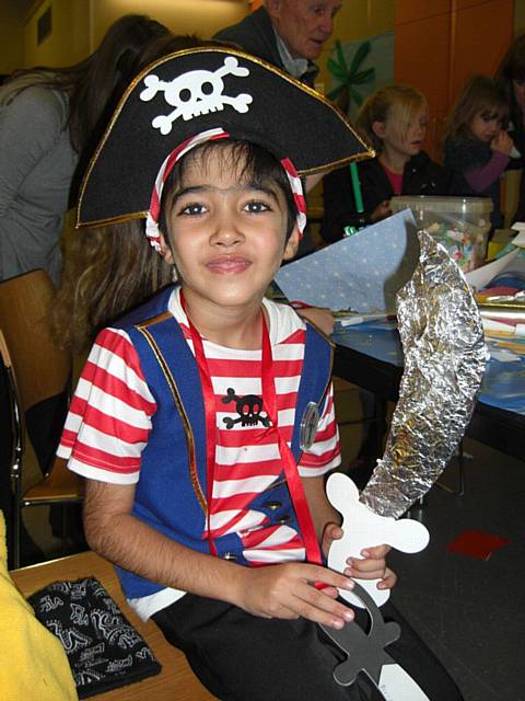 Aydan Osman dressed as a pirate enjoys making a swashbuckling sword!