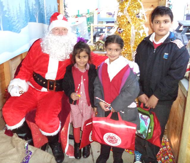 Father Christmas visits Hamer School Fair