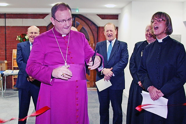 The Bishop of Middleton, the Rt Rev Mark Davies cuts the ribbon to officially open the new St Andrew's Church community centre