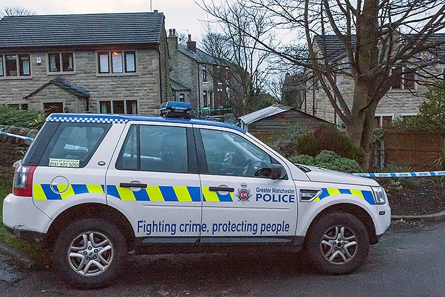 Police at the murder scene in Littleborough