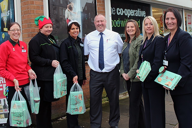 The Co-operative’s Carol Stansfield, Claire Whittaker, Joanne Walsh and Store Manager, Dave Naylor, with Rachel Saunders (Supported Housing Activity Co-ordinator), Paula Young (Mobile Warden) and Judith Reynolds (Mobile Warden), from Rochdale Boroughwide Housing