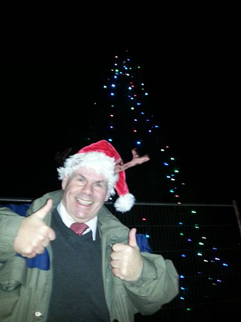 Councillor Richard Farnell switches on Kirkholt’s first-ever civic Christmas tree