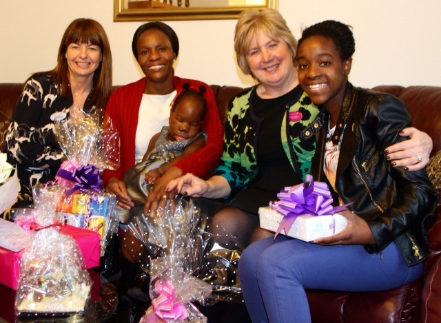 Eli Burke, head of Clinical Services, Graces mother Sarah with Grace, Jacqui Comber, Chief Executive  and Shalom