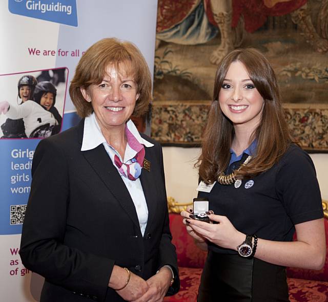 Chief Guide Gill Slocombe and Melissa Timperley with her Queen’s Guide Award 