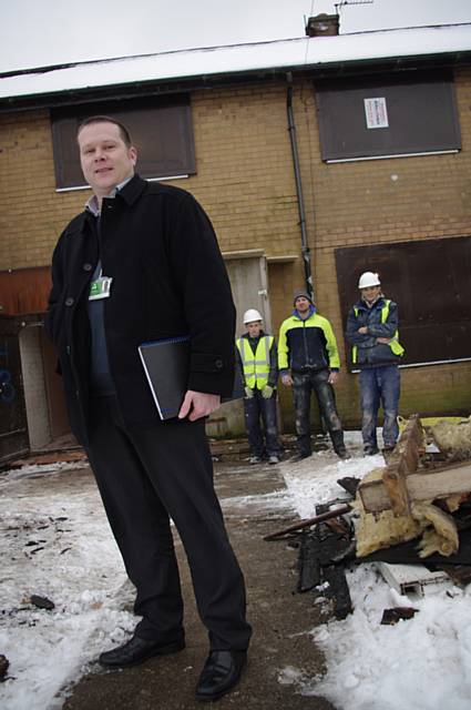 Phil Treaton with trainees visiting a current refurbishment property 
