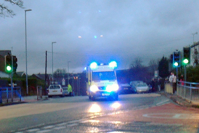 Ambulance ferrying the injured from the scene of the accident on Roch Valley Way