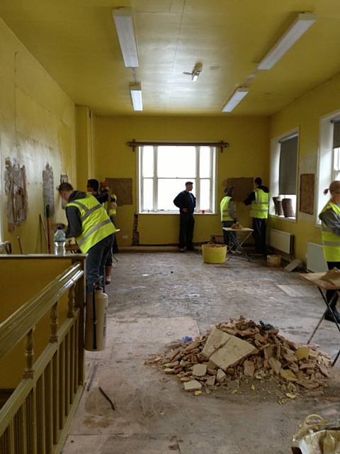 The plastering students learning their new trade under the supervision of Mike Tattersall from home to work plastering school as we partner with Hopwood Hall College