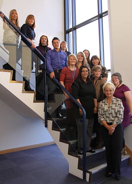 Pennine Care staff members celebrate their training successes at the awards ceremony