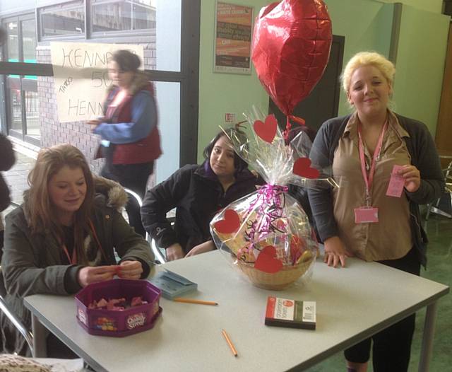 Early Years students Kirsty Rothwell, Chelsea Saville and Chloe Ransden doing a raffle