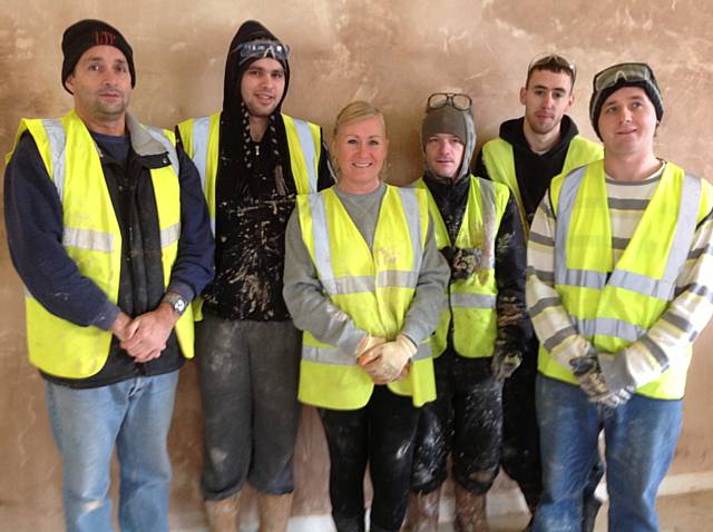 Sue Bunner with fellow plastering students