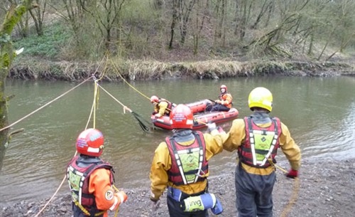 Firefighters faced a fast flowing weir during a joint training exercise