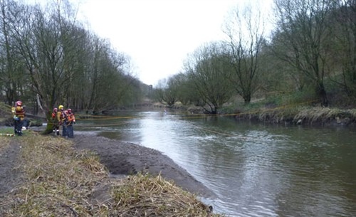 Firefighters faced a fast flowing weir during a joint training exercise