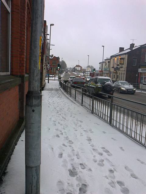 Weather warnings lead to icy pavement and snow fears for public on foot